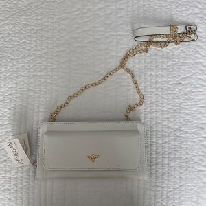White mini purse.